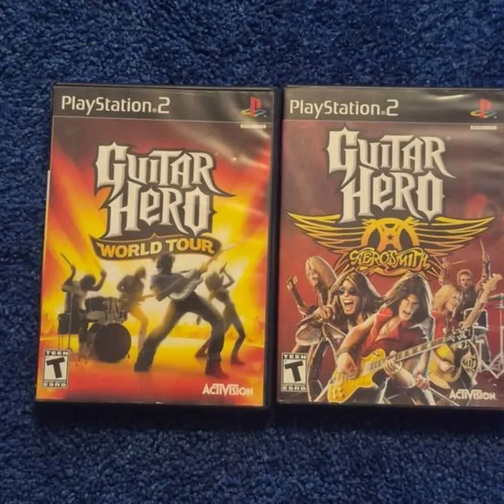 2 Guitar Hero Playstation 2 Games,  Aerosmith and World Tour